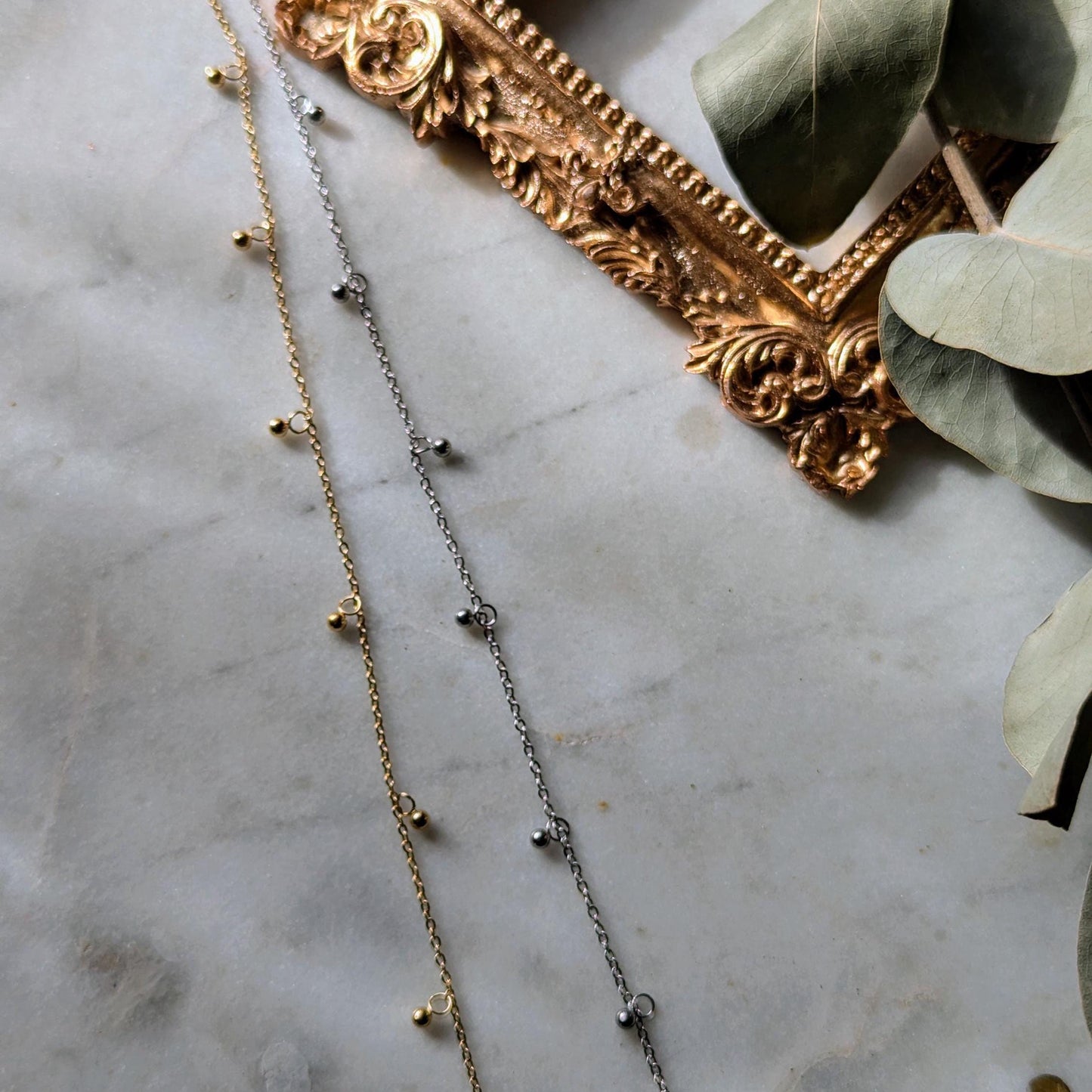 Bracelet de cheville en acier inoxydable avec petits pendentifs
