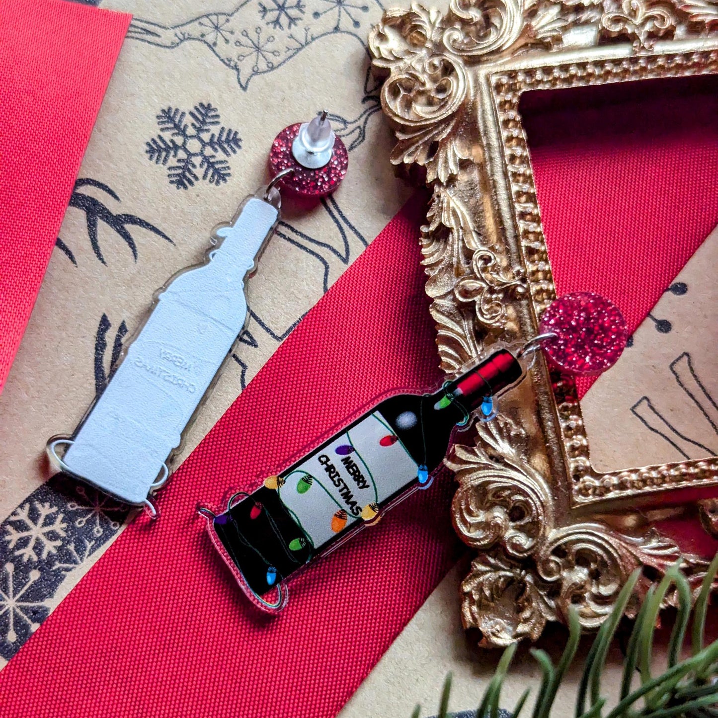 Boucles d'oreilles de Noël amusantes avec une bouteille de vin