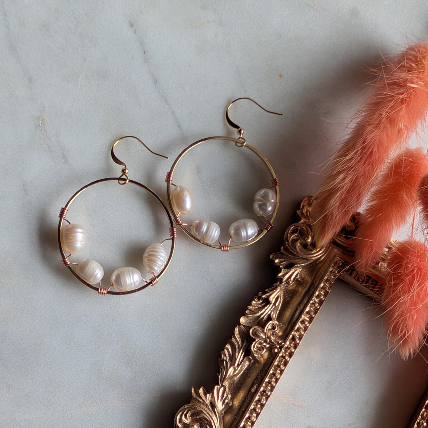 Wrapped pearl earrings with bi-metal detail
