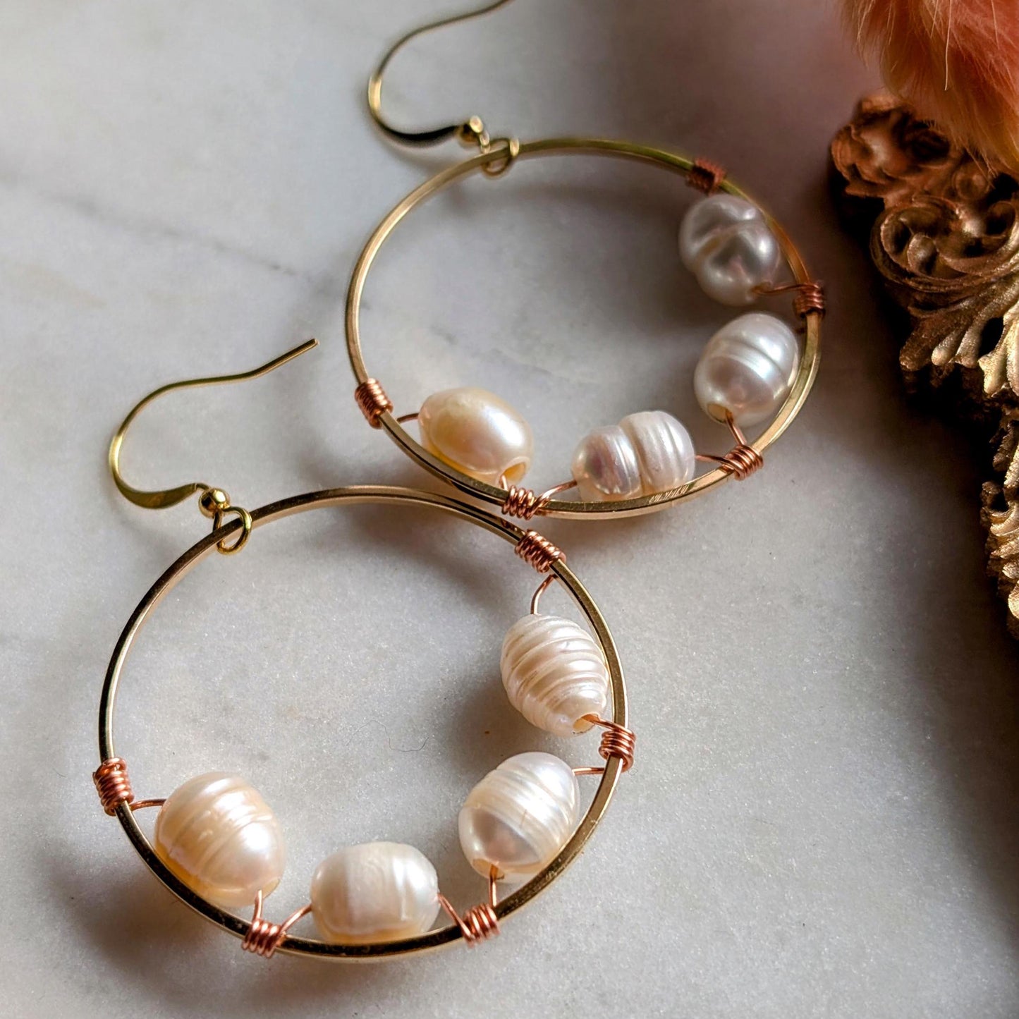 Wrapped pearl earrings with bi-metal detail
