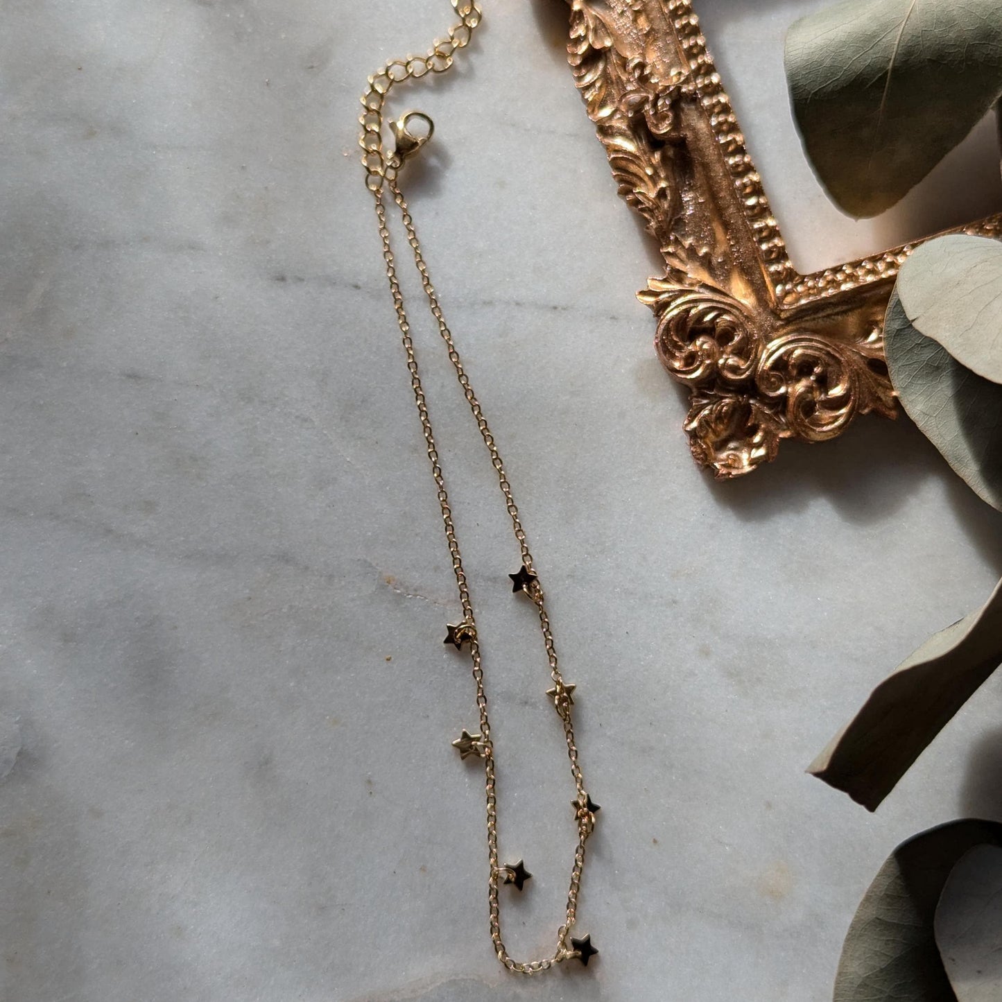 Bracelet de cheville en acier inoxydable avec petites étoiles