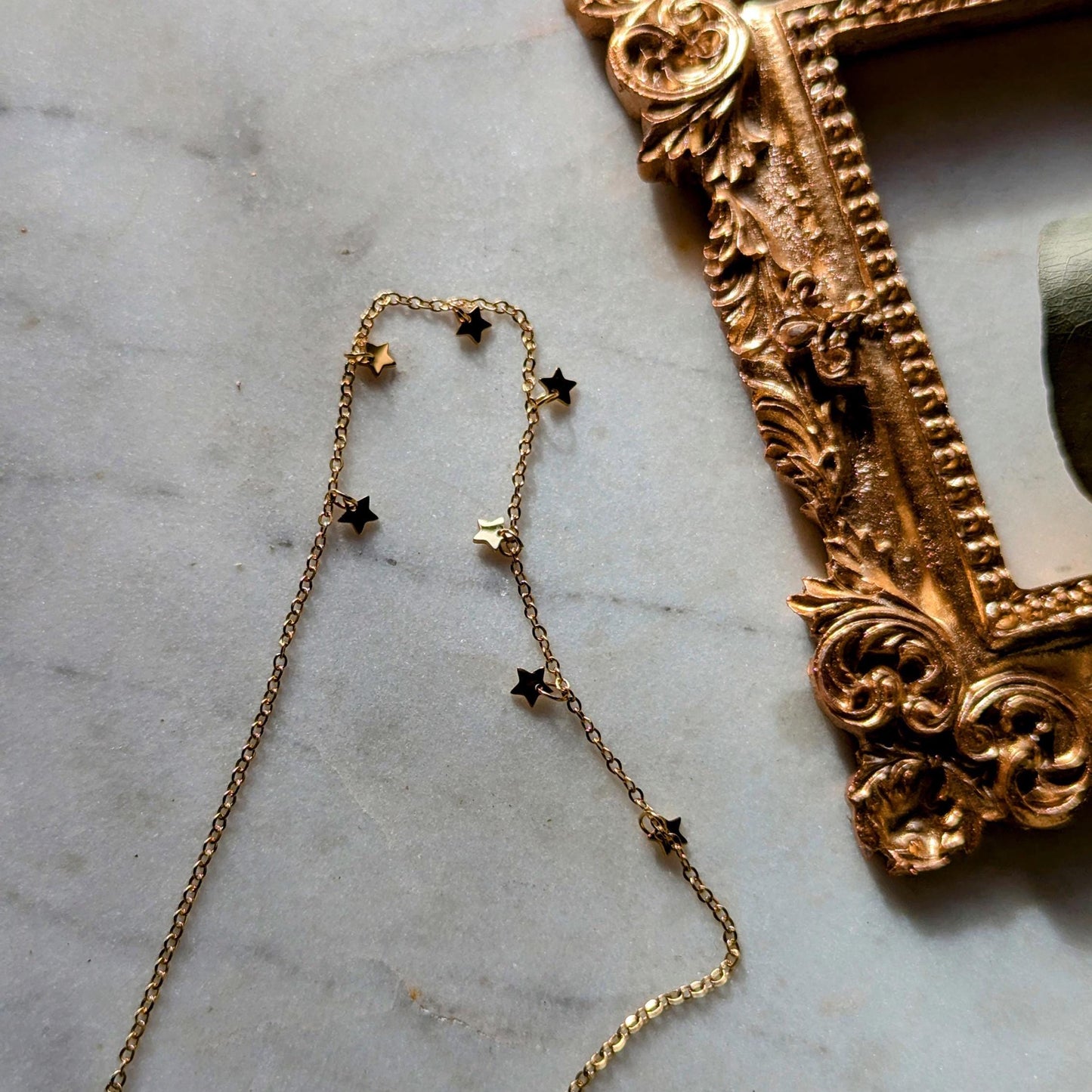 Bracelet de cheville en acier inoxydable avec petites étoiles