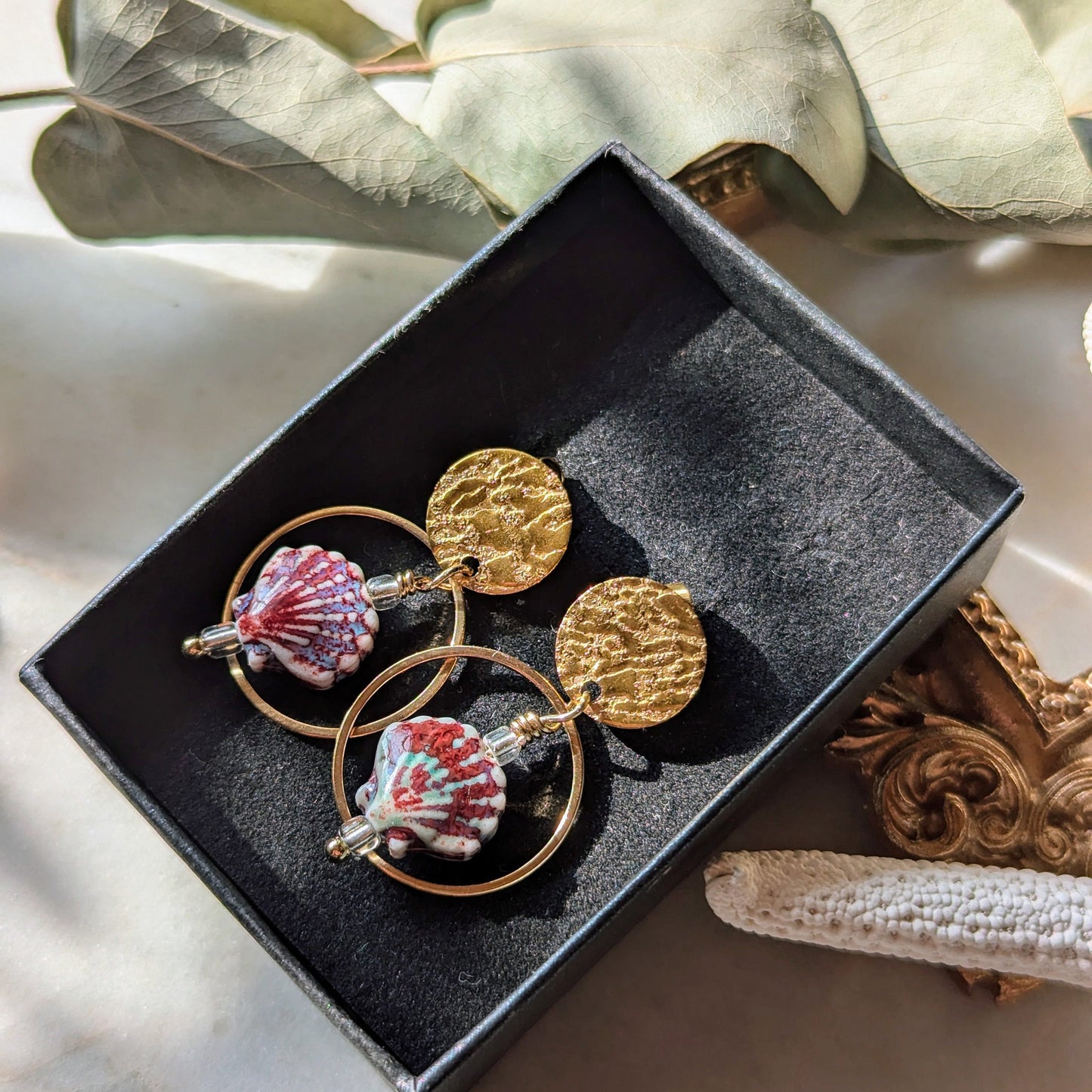 Boucles d'oreilles avec coquillage en céramique