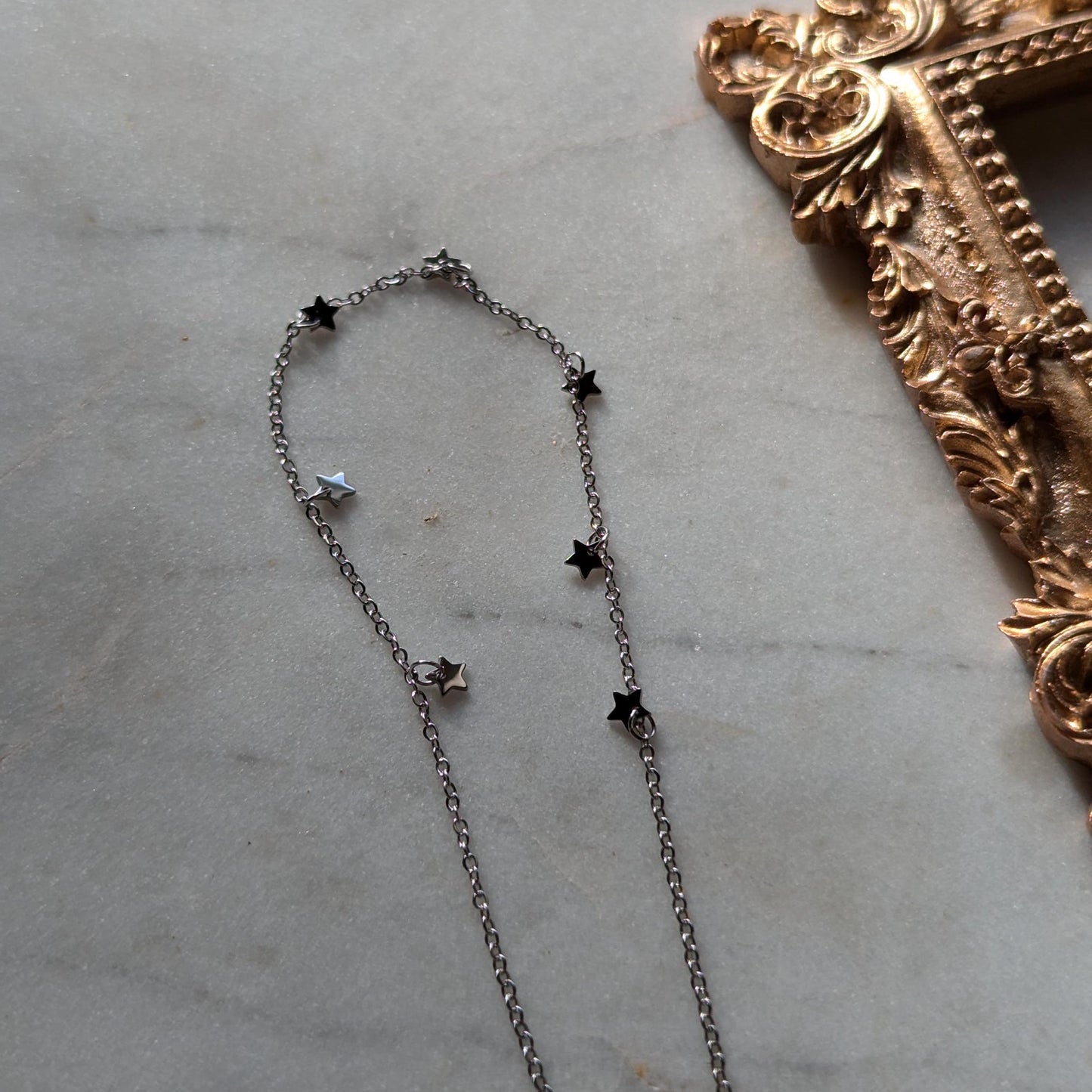 Bracelet de cheville en acier inoxydable avec petites étoiles