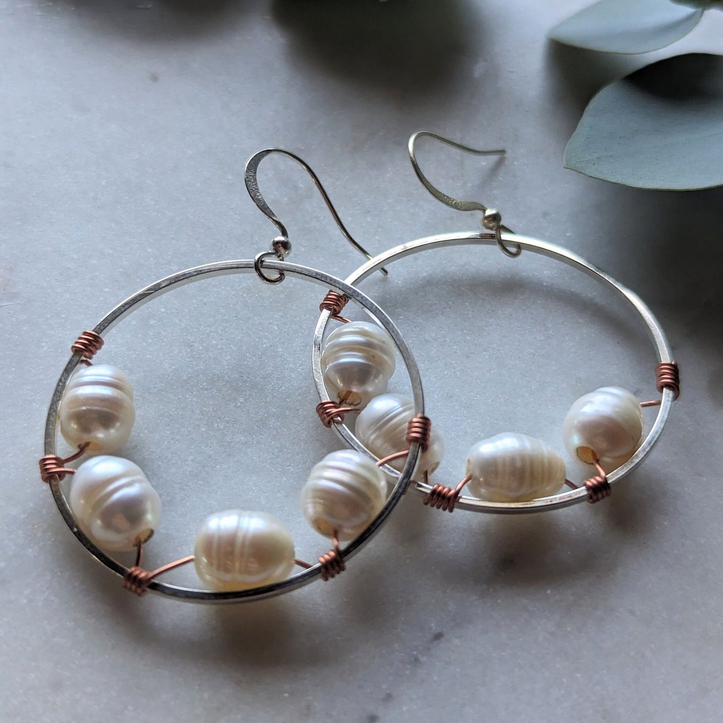 Wrapped pearl earrings with bi-metal detail