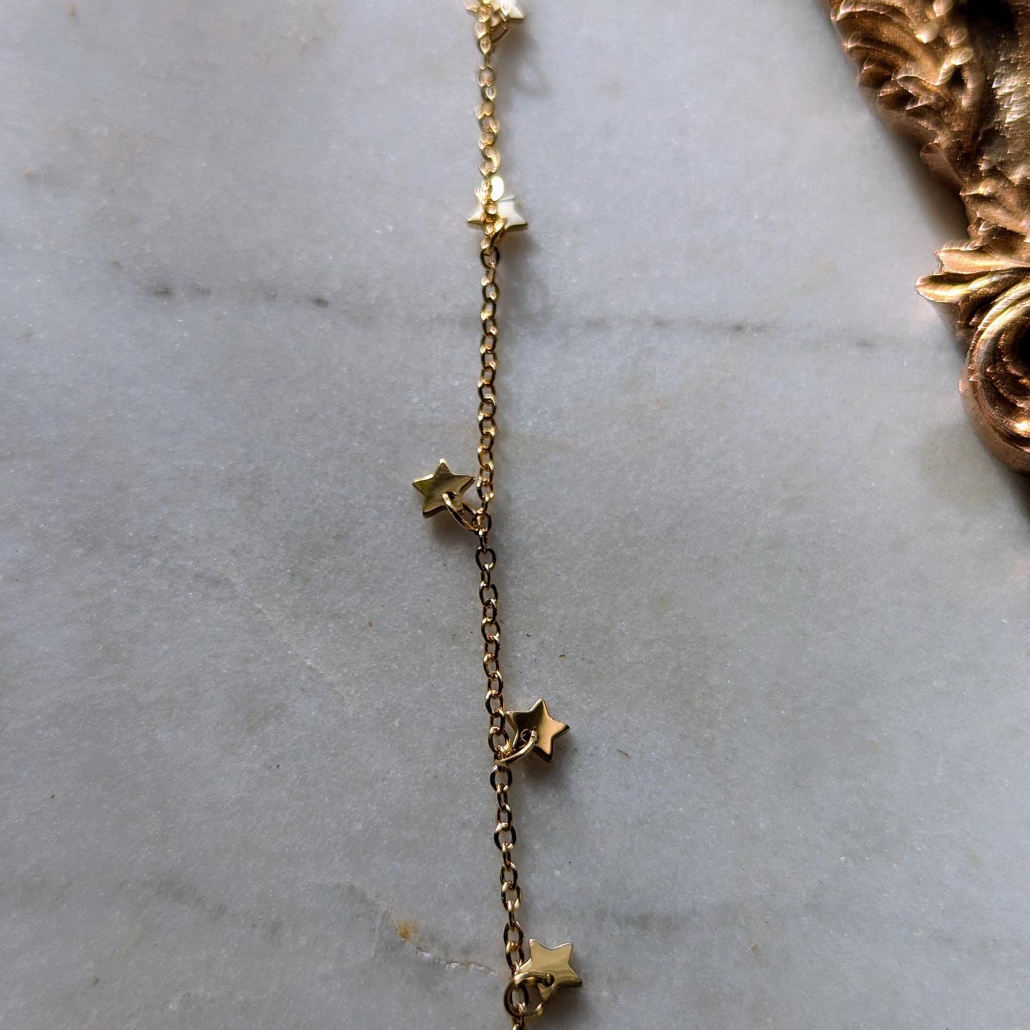 Bracelet de cheville en acier inoxydable avec petites étoiles