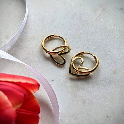 Stainless steel hoop earrings with heart pendant