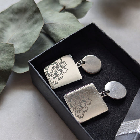 Boucles d'oreilles à tige avec pendentif fleur