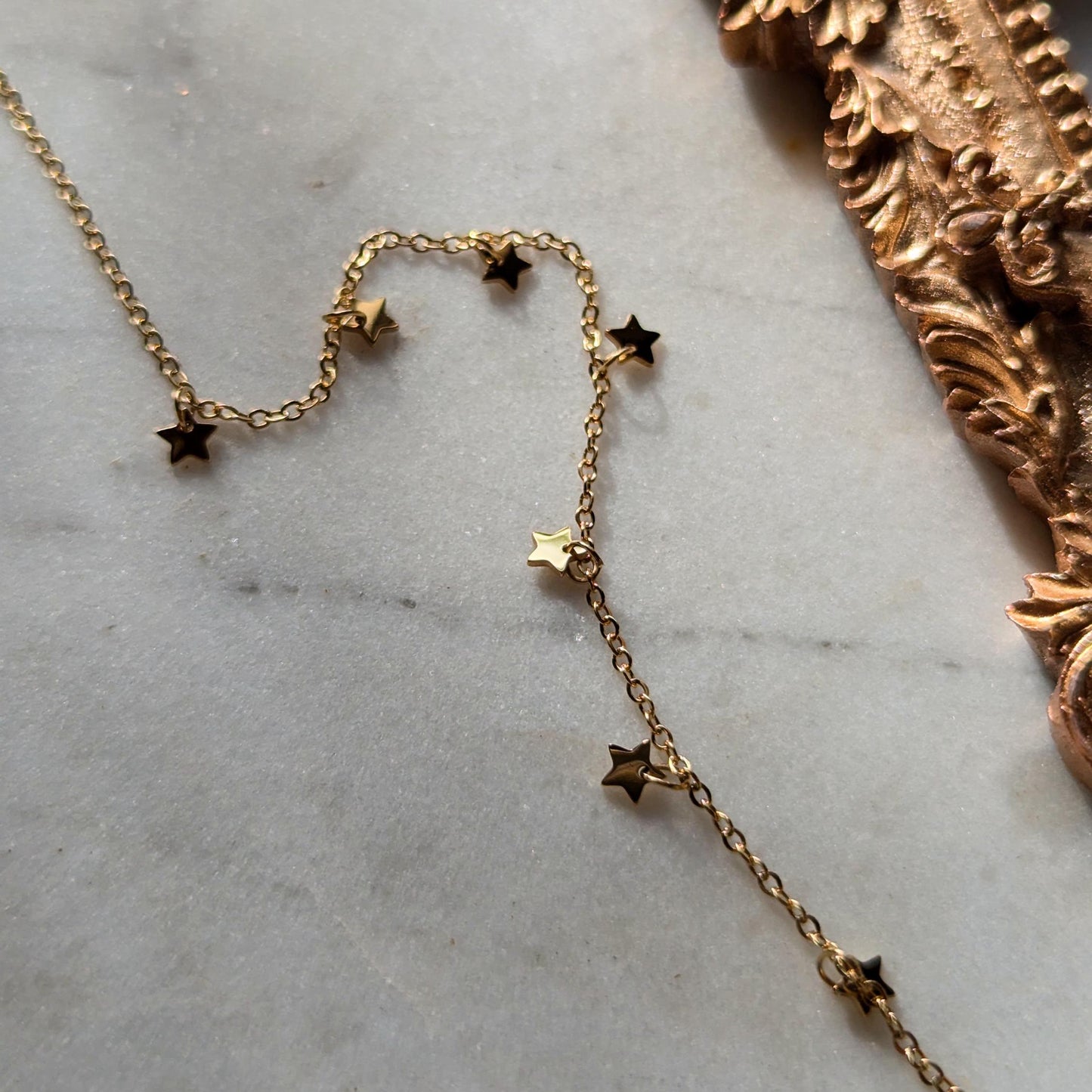 Bracelet de cheville en acier inoxydable avec petites étoiles