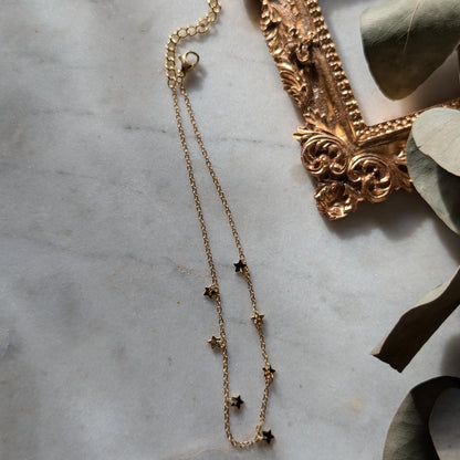 Bracelet de cheville en acier inoxydable avec petites étoiles