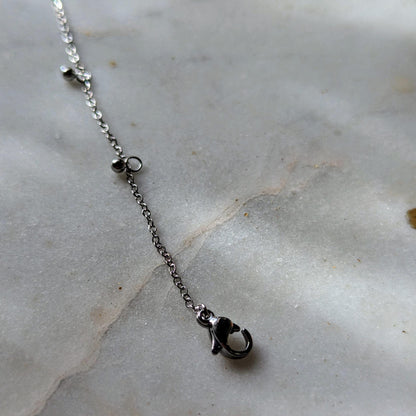Bracelet de cheville en acier inoxydable avec petits pendentifs