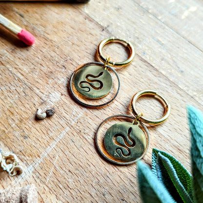 Hoop earrings with snake pendant