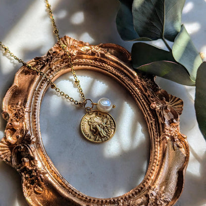 Necklace with antique coin and freshwater pearl