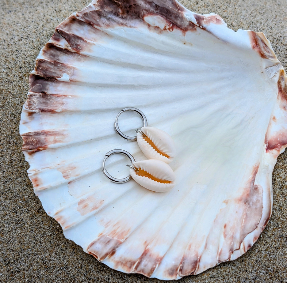 Stainless steel hoop earrings with cowrie shells