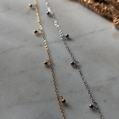 Bracelet de cheville en acier inoxydable avec petits pendentifs